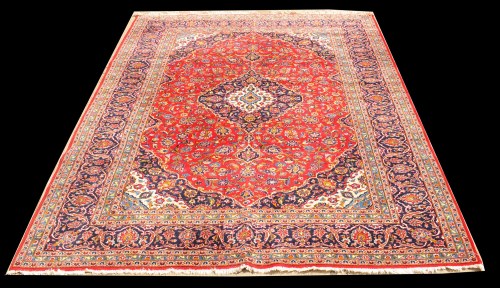 Lot 1033 - A Kashan carpet, the central diamond-shaped...