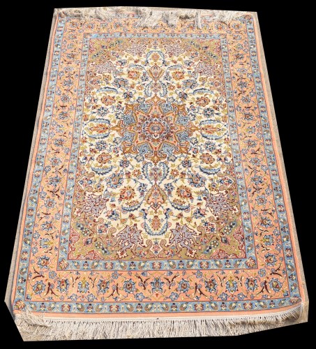 Lot 1042 - An Isfahan rug, the central rosette on ivory...