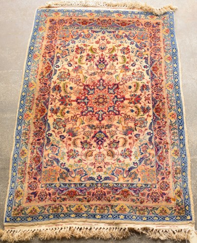 Lot 1050 - An Isfahan rug, with central rosettes...
