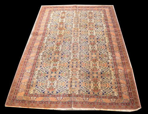 Lot 1060 - A Caucasian rug, with decorative medallions...