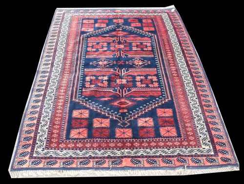 Lot 1071 - A Bakhtiari carpet, the shaped medallions...