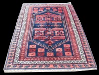 Lot 1071 - A Bakhtiari carpet, the shaped medallions...