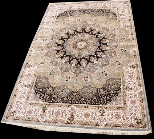Lot 1080 - A silk carpet, the central rosette medallion...