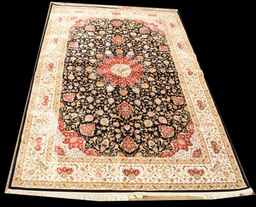 Lot 1084 - A silk carpet, the central rosette and floral...