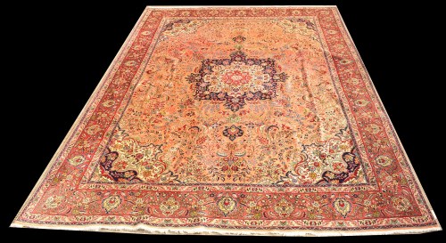 Lot 1089 - A large Tabriz style Persian carpet, the...