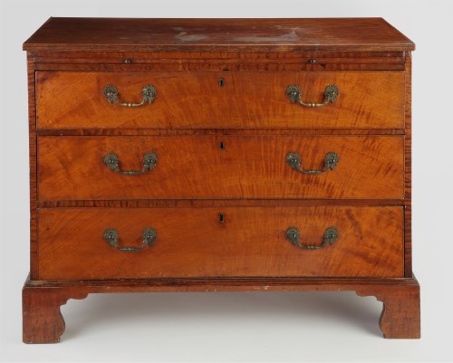 Lot 1146 - A George III mahogany chest of three long...