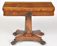 Lot 1153 - A Regency rosewood turnover swivel top card...
