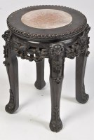 Lot 1159 - An early 20th Century Chinese carved hardwood...