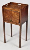 Lot 1191 - A George III mahogany pot cupboard, with...