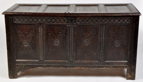 Lot 1201 - An 18th Century oak coffer, the plain panel...