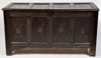 Lot 1201 - An 18th Century oak coffer, the plain panel...