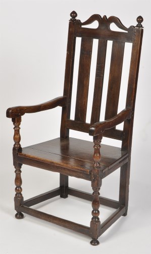 Lot 1214 - An 18th Century and later joined oak open arm...