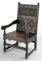 Lot 1229 - A late 17th Century joined oak open armchair,...