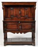 Lot 1230 - A 17th Century and later oak livery cupboard,...