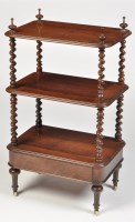 Lot 1244 - An early 19th Century rosewood three-tier...