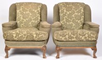 Lot 1254 - A pair of reproduction easy armchairs, the...