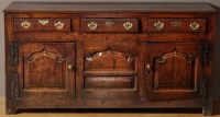 Lot 1263 - An 18th Century oak dresser base, fitted three...