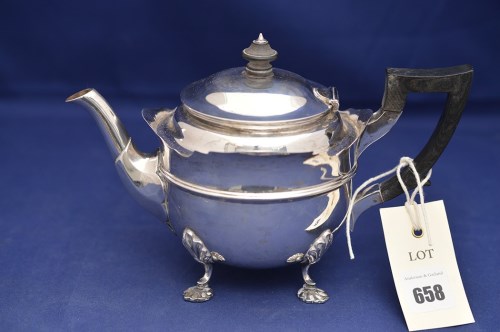 Lot 658 - An Edward VII silver teapot, by Reid & Sons,...