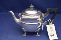Lot 658 - An Edward VII silver teapot, by Reid & Sons,...