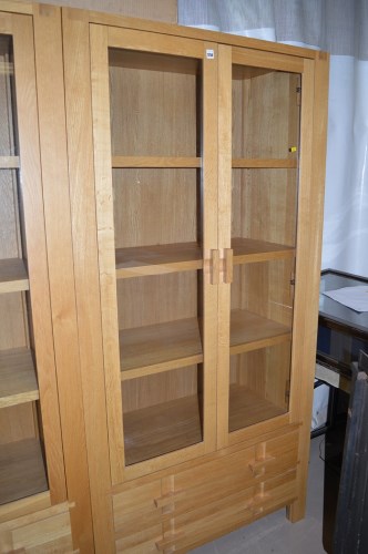 Lot 1256 - A modern oak cupboard by John Lewis, glazed...