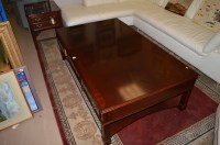 Lot 553 - A large mahogany rectangular coffee table,...