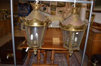 Lot 558 - A pair of late 19th/early 20th Century brass...