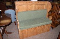 Lot 569 - A 20th Century pitch pine hall bench, two...