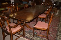 Lot 594 - A Regency style extending dining table, the...