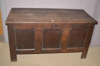 Lot 704 - An 18th/19th Century oak coffer, carved...