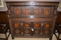 Lot 720 - An early 20th Century oak buffet sideboard, by...