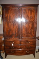 Lot 722 - A 19th Century mahogany linen press cupboard...