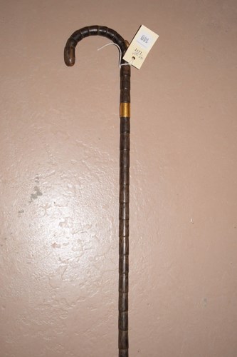 Lot 149 - A Brigg, London malacca walking cane, fitted...