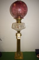 Lot 282 - A late 19th Century brass oil lamp, with...