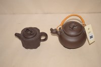 Lot 352 - Two Chinese Yixing stone ware teapots and...