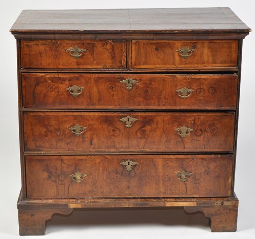 Lot 722 - A George II walnut chest of two short and...