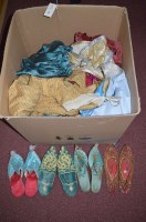 Lot 1002 - A small collection of harem type clothing;...