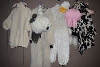 Lot 1023 - Animal theatre costumes: two sheep; a cow; and...