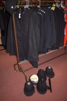 Lot 1065 - Police officer uniforms and coats; a cape;...