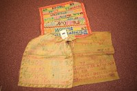 Lot 1104 - Two 19th Century woolwork alphabet samplers,...