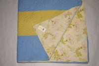 Lot 1129 - An early 20th Century Durham quilt, floral...