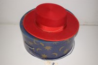 Lot 1152 - A Seville red felt hat, by Ferandezy Roche,...