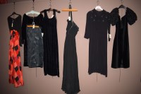 Lot 1184 - 1970's and later ladies black evening wear, by...