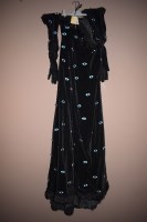 Lot 1188 - A 1970's black full length dress and matching...