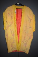 Lot 1195 - A 1920's kimono style yellow bedroom jacket,...