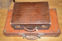 Lot 1199 - A mid 20th Century crocodile travelling case;...