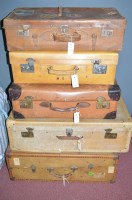 Lot 1200 - Five travelling trunks and leather suitcases...