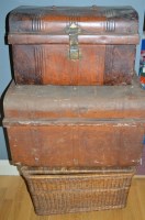 Lot 1201 - Two metal travelling trunks; and a wicker...