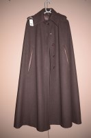 Lot 1204 - A 1973 brown woolen cape, by Feminella, size...