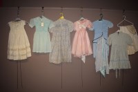 Lot 1206 - Mid 20th Century children dresses, one smock...