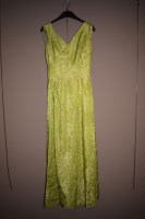 Lot 1227 - A green and floral decorated full length dress,...